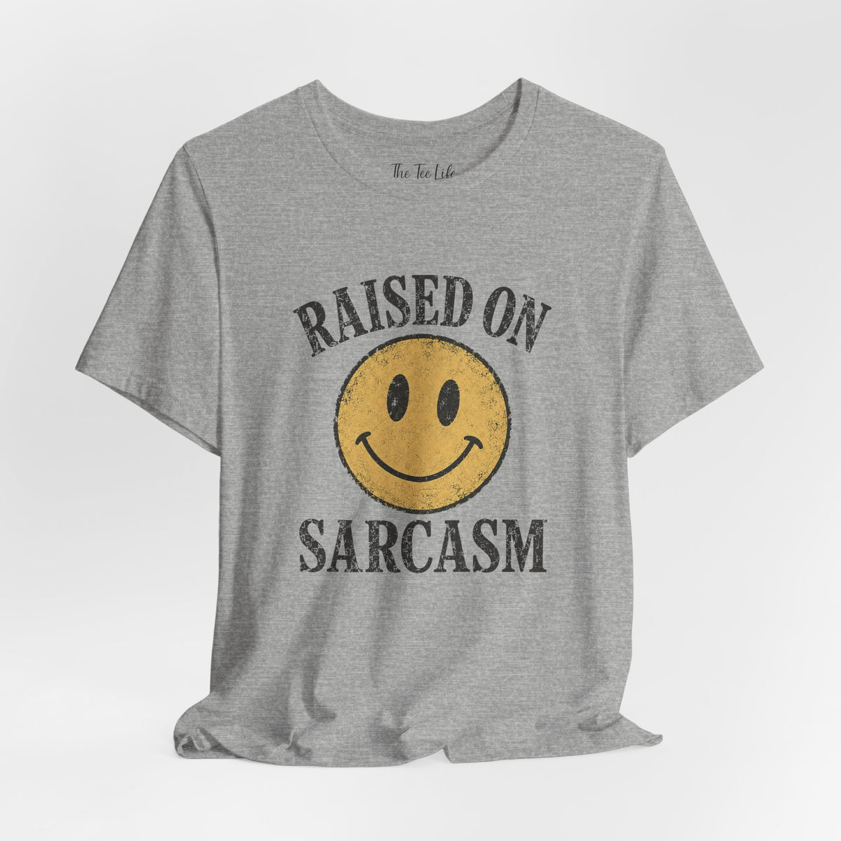Raised on Sarcasm Smiley Tee