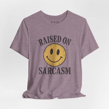 Raised on Sarcasm Smiley Tee