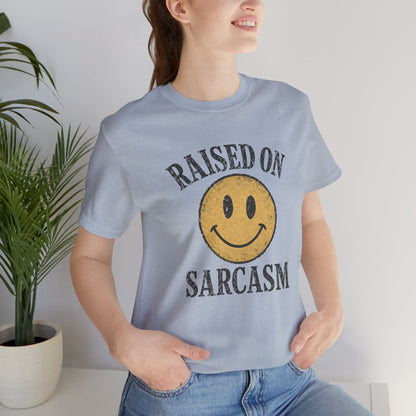 Raised on Sarcasm Smiley Tee